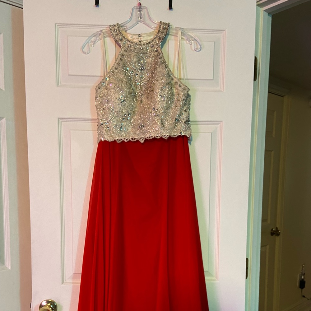 Red and Gold prom dress. Worn once. Size 3/4. It’s a two-piece.